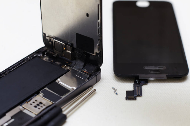 Close-up photos showing process of mobile phone repair - Φωτογραφία, εικόνα