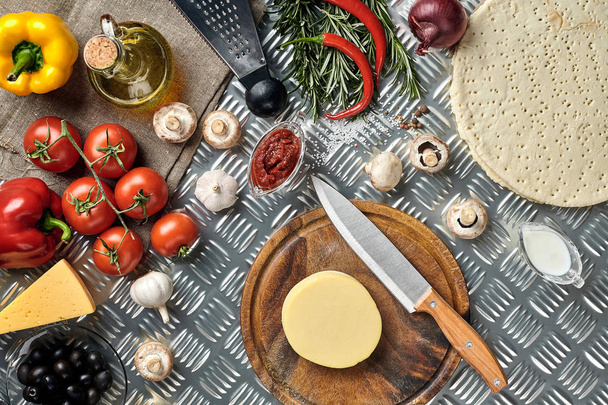 Ingredients for cooking pizza on metal table, top view - Fotografie, Obrázek