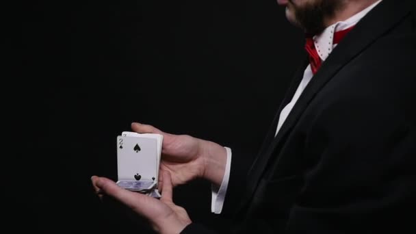 magic, card tricks, gambling, casino, poker concept - man showing trick with playing cards - Metraje, vídeo