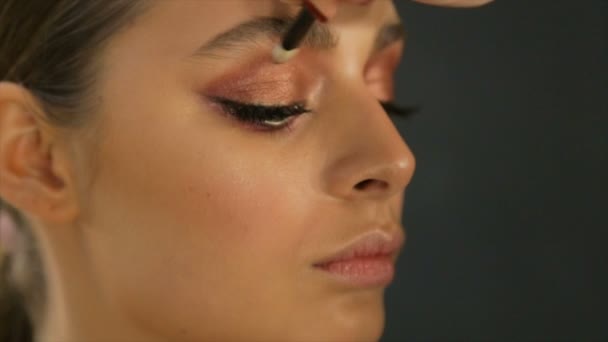 Close-up of eye makeup.full hd video - Felvétel, videó