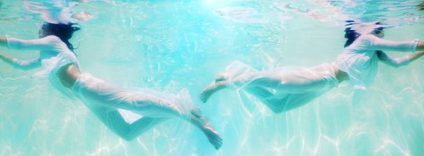 женщина красивое тело плавать под водой в белом платье
 - Фото, изображение