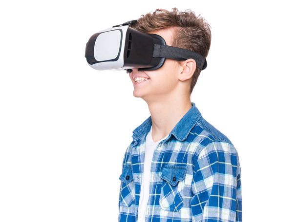 Teen boy with VR glasses - 写真・画像