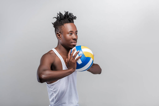 athletic African-American man with volleyball - Φωτογραφία, εικόνα
