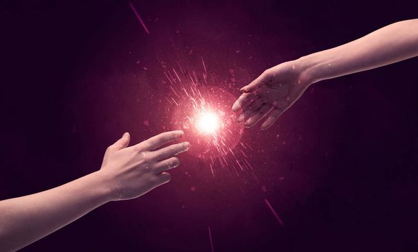 Touching hands light up sparkle in space - Foto, Imagem