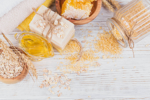 Honeycomb, sea salt, oats and handmade soap with honey - Photo, Image