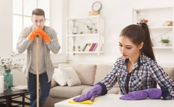 Young couple cleaning home together - Photo, Image