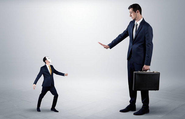 Conflict between small and big businessman - Foto, Imagen