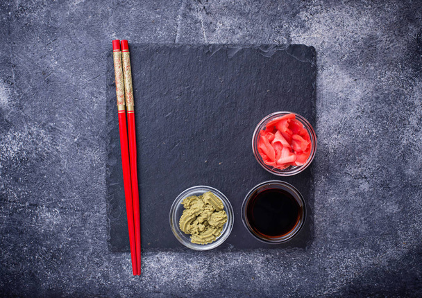 Wasabi, ginger and soy sauce.  - Foto, afbeelding