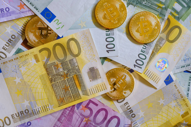 Gold Bitcoins, Crypto currency and Euro banknotes - Fotoğraf, Görsel