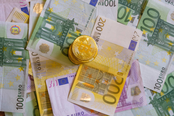 Gold Bitcoins, Crypto currency and Euro banknotes - Foto, Imagen