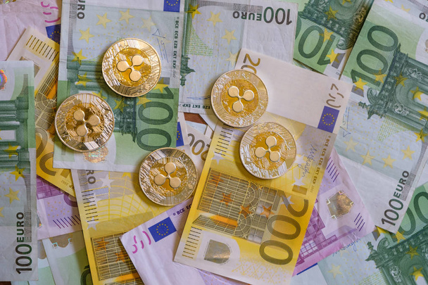 Ripple coins, Crypto currency and Euro banknotes - Foto, Imagen
