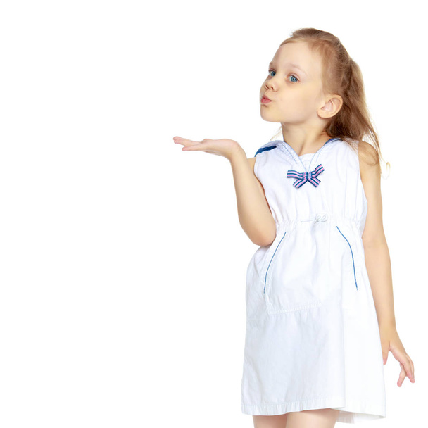 Little girl is showing a finger - Valokuva, kuva