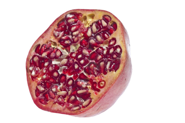 Pomegranate seeds close up shot - Foto, afbeelding