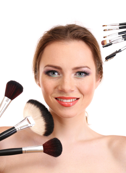 portrait of beautiful woman with make-up brushes, isolated on white - Fotó, kép