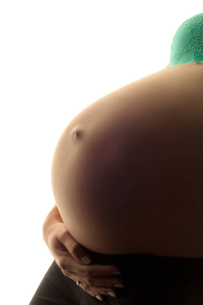 Barriga de uma mulher grávida. Gravidez da última etapa. 9 meses
. - Foto, Imagem