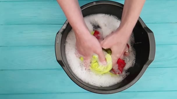 Hands wash clothes in a basin - Footage, Video