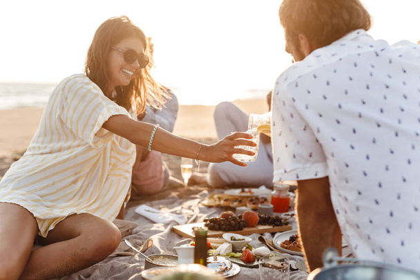 people Drinking on Beach Picnic - Фото, изображение