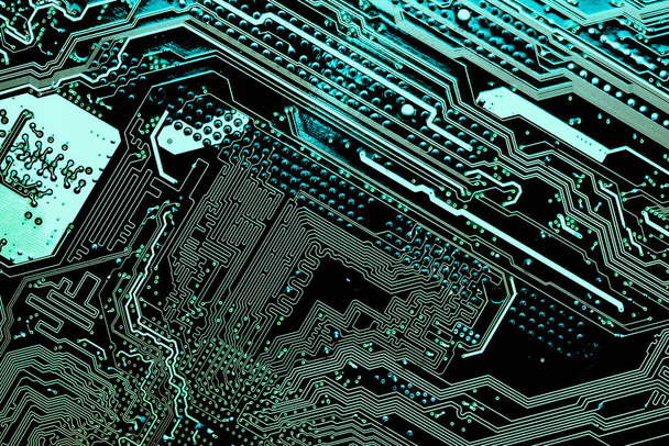 Fechar de uma placa de circuito de computador azul impressa
 - Foto, Imagem