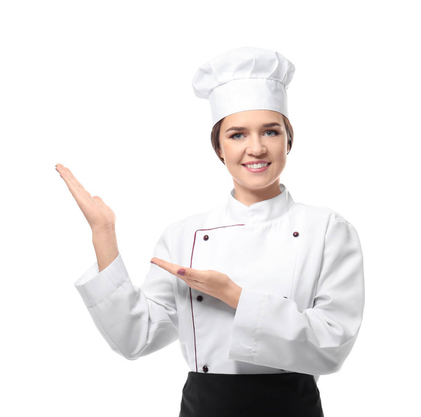 Portrait of female chef on white background - Foto, afbeelding