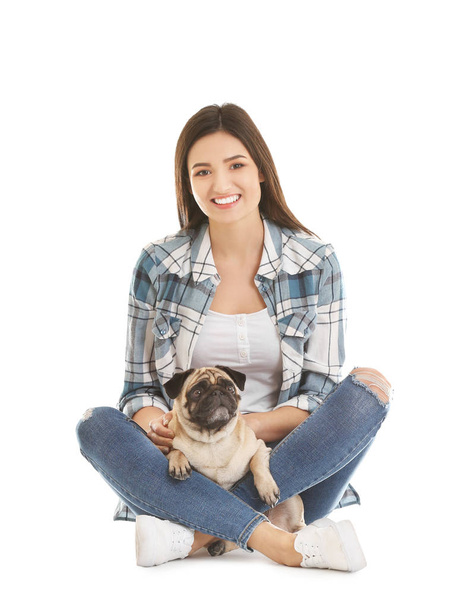 Woman with cute dog on white background. Friendship between pet and owner - Fotó, kép