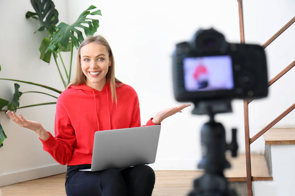 Female blogger recording video indoors - Фото, изображение
