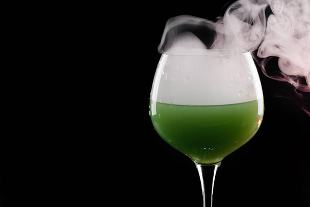 Wine glass with smoke inside and out - Photo, image
