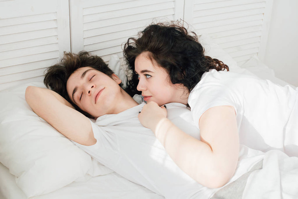 Couple in love sleeps cuddling in bed  - Foto, Bild