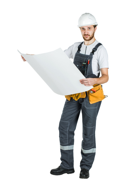 Full length portrait of a male builder. repair and construction. Isolated on white background. - Fotó, kép