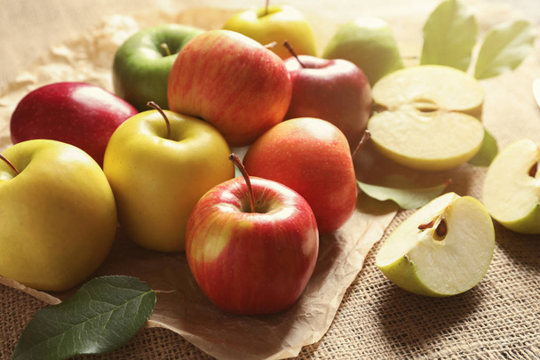 Ripe juicy apples on sackcloth - Fotografie, Obrázek