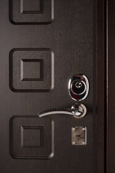 The apartment's metal security burglar door - Foto, Imagen