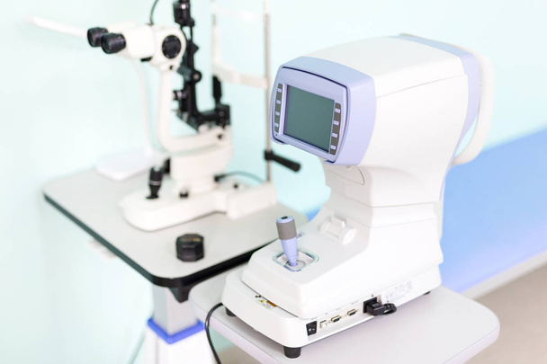 Modern ophthalmology clinic. Keratometer device measuring curvature of cornea. Prevention of astigmatism desease. 	High-tech solutions for eye care - Zdjęcie, obraz