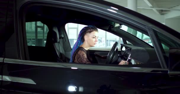 Black Tesla electric car model X in the promotion showroom. - Filmati, video