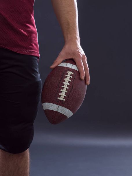 closeup American Football Player isolated on gray - Foto, Imagem