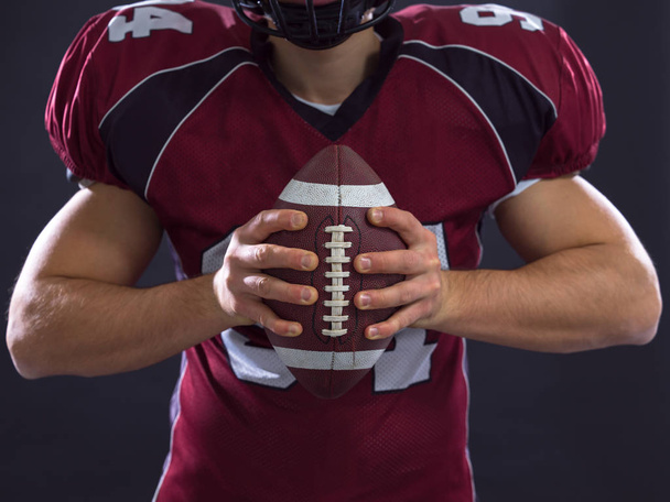 closeup American Football Player isolated on gray - Photo, Image