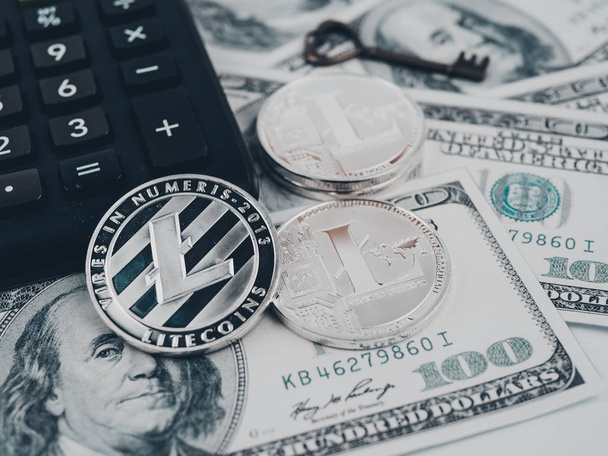 Litecoin golden coin New virtual money and dollar background . - Photo, Image
