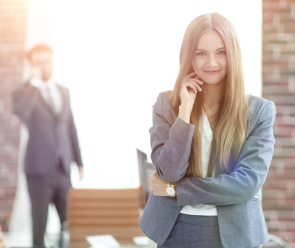 successful business woman on blurred background office - Фото, зображення