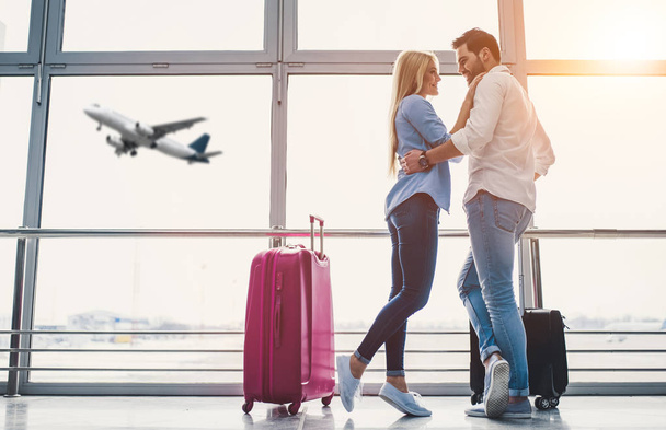 Couple in airport - Photo, image