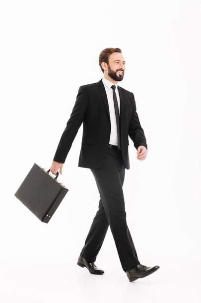 Full-length photo of smiling ambitious man in business suit goin - Fotó, kép