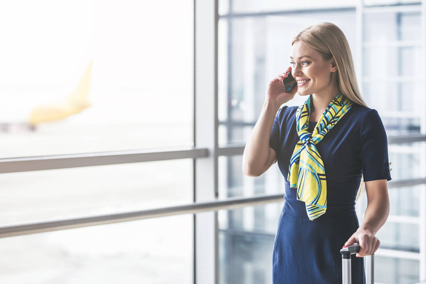 Flight attendant in airport - Photo, Image