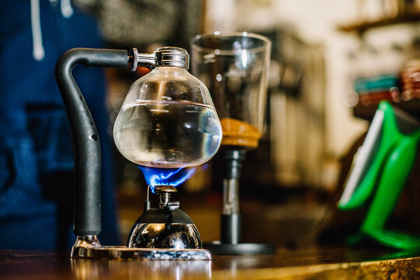 Siphon vacuum coffee maker on cafe bar - Photo, Image