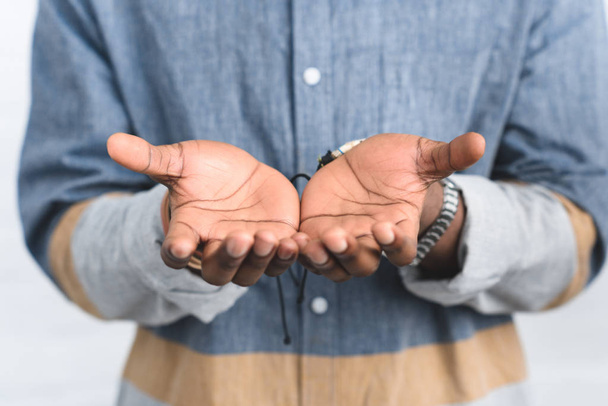 Close-up view of african american male hands - Photo, Image