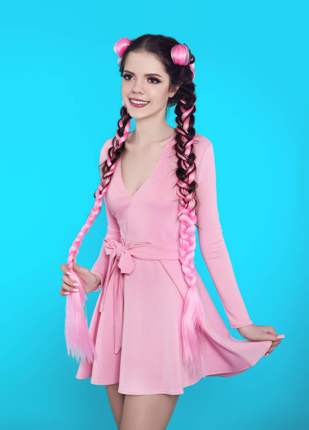 Pretty teen girl with two french braids from pink kanekalon, fas - Foto, immagini