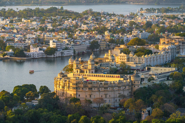 Lake Pichola with City Palace view in Udaipur, Rajasthan, India - Photo, Image