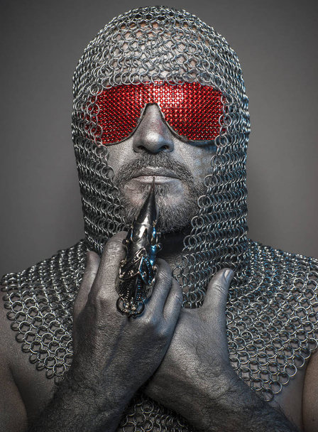 firewall, man with iron armor and red glasses, concept of protection and computer security - Fotografie, Obrázek