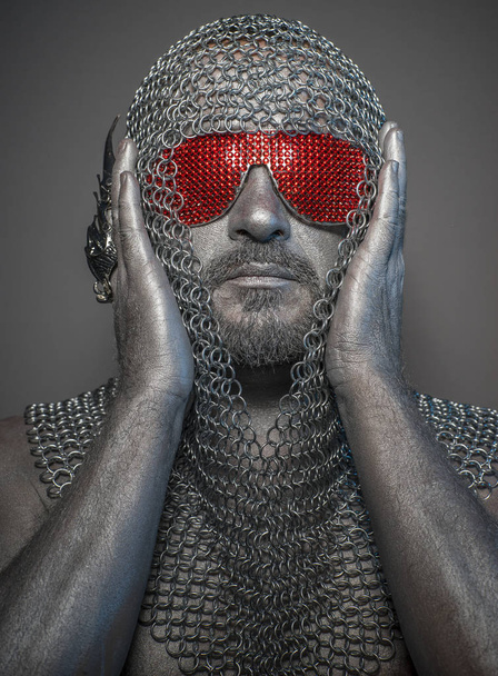 firewall, man with iron armor and red glasses, concept of protection and computer security - Фото, зображення