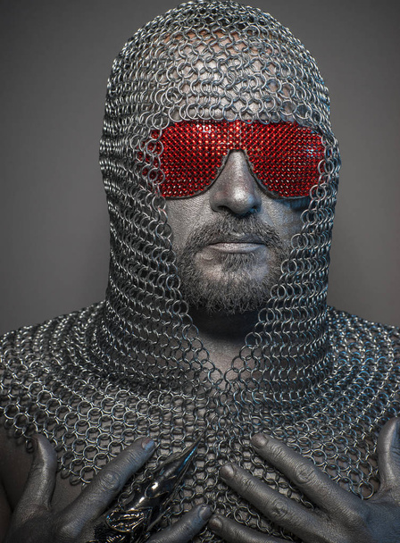 firewall, man with iron armor and red glasses, concept of protection and computer security - Foto, Bild
