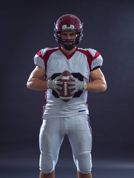 American Football Player isolated on gray - Foto, immagini