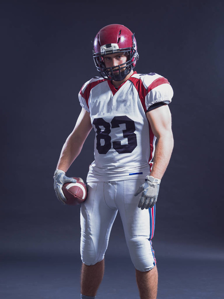 American Football Player isolated on gray - Фото, изображение