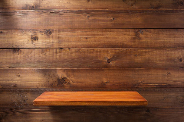shelf at wooden background wall - Photo, Image