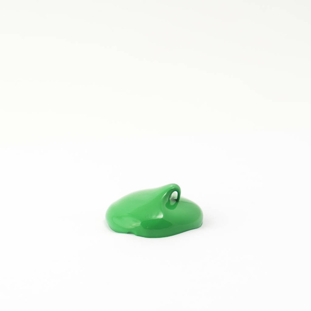 a drop of acrylic green color on a white surface - Fotografie, Obrázek